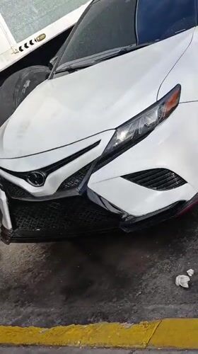 White Toyota Camry spotted parked beside truck in Juan Griego