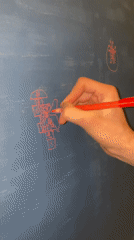 Red marker graffiti art spotted on Moscow wall