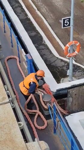 Barge transits Vytegra Lock on Volga-Baltic Waterway, Russia