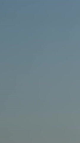 This media file is a short video of the sky over Buljarica, Montenegro. The sky is a pale blue with a slight haze, suggesting it is either early morning or late afternoon. There are no visible subjects or objects in the frame, and no discernible activity or event taking place. The overall mood is tranquil and serene, with the vast expanse of the sky filling the entire frame. There is no visible text in the media file.