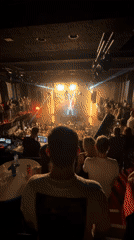 Concert crowd in dark Sofia venue