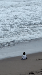 Quiet beach moments with child, mother, baby, dog in Kuta