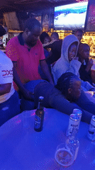 Evening social gathering at Nairobi bar with dancing and drinks