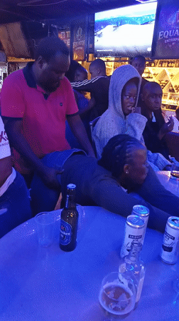 Evening social gathering at Nairobi bar with dancing and drinks