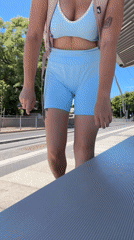 Casual street moment on a Tel Aviv sidewalk, summer 2026