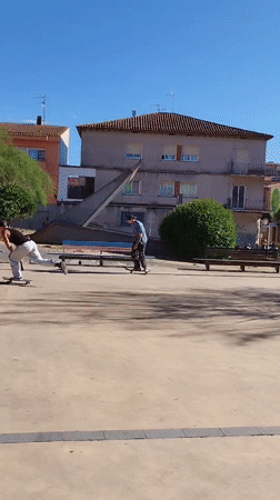 Two skateboarders enjoy sunny afternoon in Rubí park