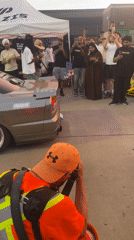 Custom lowered sedan draws photographers at Toronto outdoor meetup