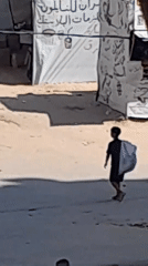 Morning life continues in a Gaza displacement settlement
