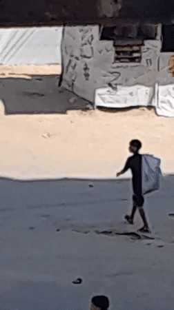 Morning life continues in a Gaza displacement settlement