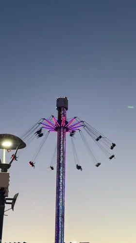 Nesebar amusement park and street life at dusk