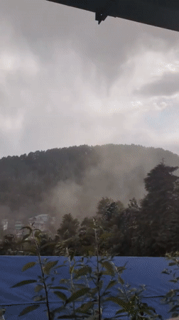Daily life captured across Indian mountain towns during afternoon hours