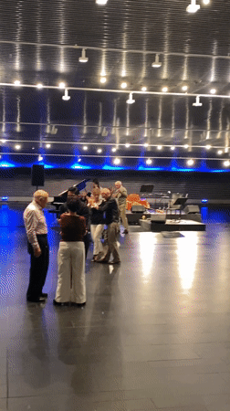 Evening street activity documented near Buenos Aires subway entrance