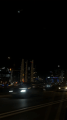 Moscow nightscape captured showing illuminated buildings and historic hotel
