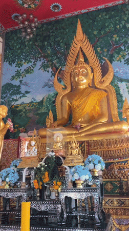 Inside and outside a ornate Buddhist temple in Ko Samui