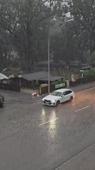 Summer downpour rolls through Garmisch-Partenkirchen streets