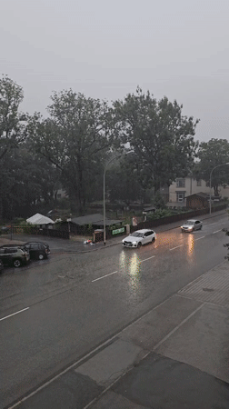 Summer downpour rolls through Garmisch-Partenkirchen streets