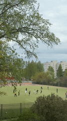 Russian neighborhood life: soccer game, domestic scenes with cat and baby