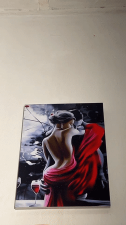 Couple's embrace painting observed on wall in Nigeria