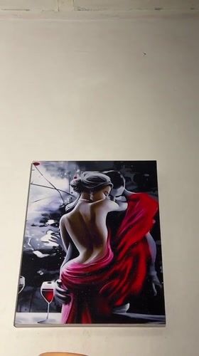 Couple's embrace painting observed on wall in Nigeria