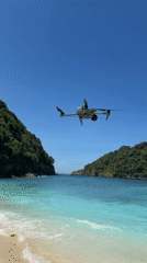 Drone spotted over pristine Nusa Penida beach at dawn