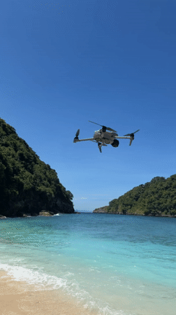 Drone spotted over pristine Nusa Penida beach at dawn