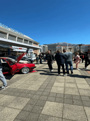 Street fair draws crowds around displayed vehicles in Bar