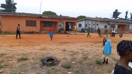 Soccer match played on dirt field in Badagry, Nigeria