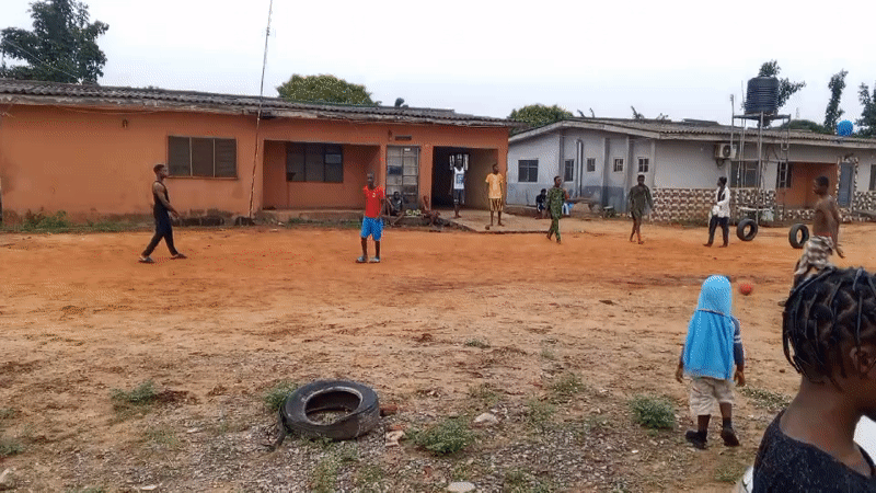 Soccer match played on dirt field in Badagry, Nigeria