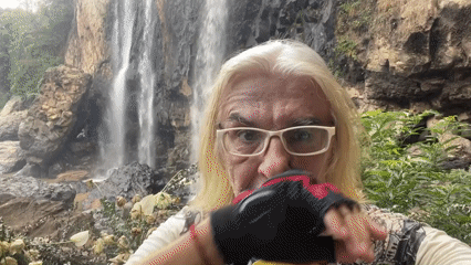 Tourist documents early morning waterfall visit in northern Vietnam