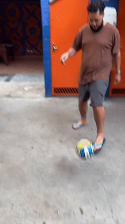 Casual soccer practice session in São Paulo courtyard