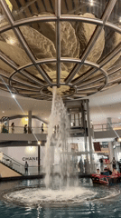 Shopper documents luxury retail displays at Marina Bay Sands
