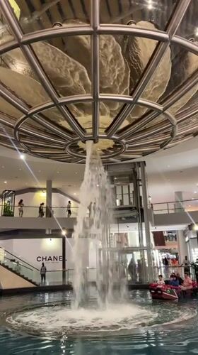 Shopper documents luxury retail displays at Marina Bay Sands