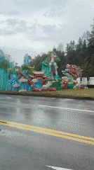 Colorful roadside display with horse and dragon spotted in Zhangjiajie