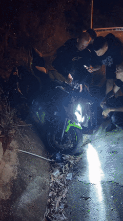 Motorcycle crash in Vietnam draws roadside assistance from bystanders