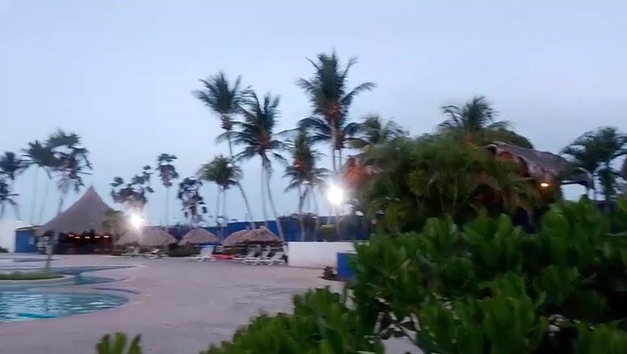 Resort twilight scenes documented at Playa El Agua, Venezuela