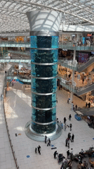 Shopping mall visitors document aquarium centerpiece in Khimki Russia