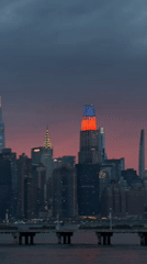 NYC skyline captured at dusk with illuminated Empire State Building
