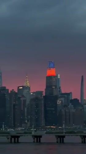 NYC skyline captured at dusk with illuminated Empire State Building