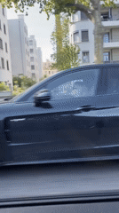 Black Porsche spotted on Lyon streets during afternoon drive