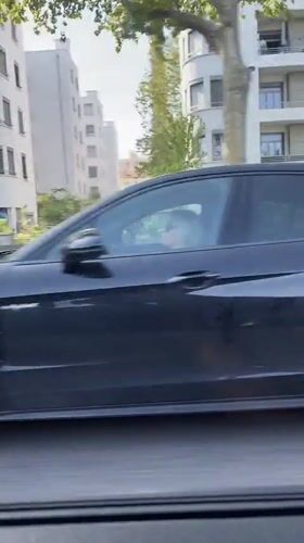 Black Porsche spotted on Lyon streets during afternoon drive