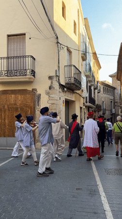 Traditional street procession with live music in El Vendrell