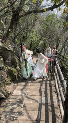 Tourists in traditional dress visit Wulingyuan Scenic Area