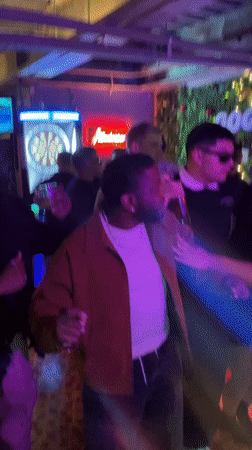 Young adults dance at nightclub in Daegu, South Korea