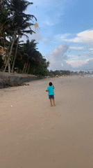 Families enjoy beach day activities along Sri Lankan coast
