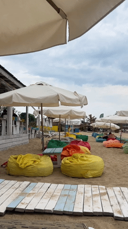 Overcast beach day in Sozopol, Bulgaria — lounging and drinks