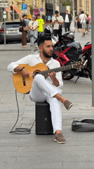 Street musicians playing guitar and balalaika in central Moscow