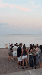 Evening beach gathering with music and dining in Montenegro