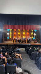 Children's choir performs at Juan Griego auditorium amid community gathering