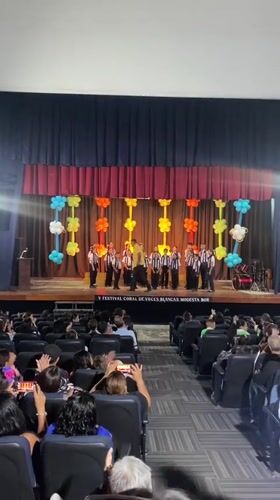 Children's choir performs at Juan Griego auditorium amid community gathering