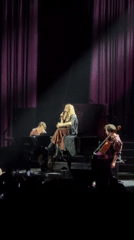 Concert with blonde vocalist and orchestra performed in Paris